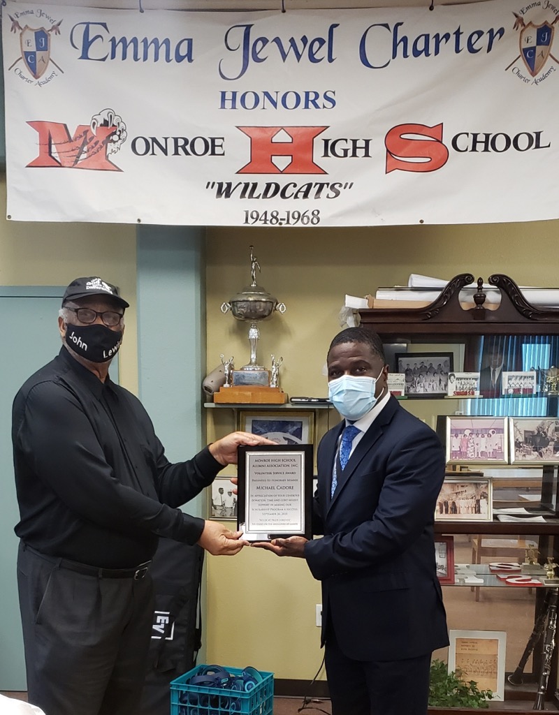 David Jenkins presents plaque to Michael Cadore for his contribution to the MHSAA,Inc 2020 Scholarship Award video